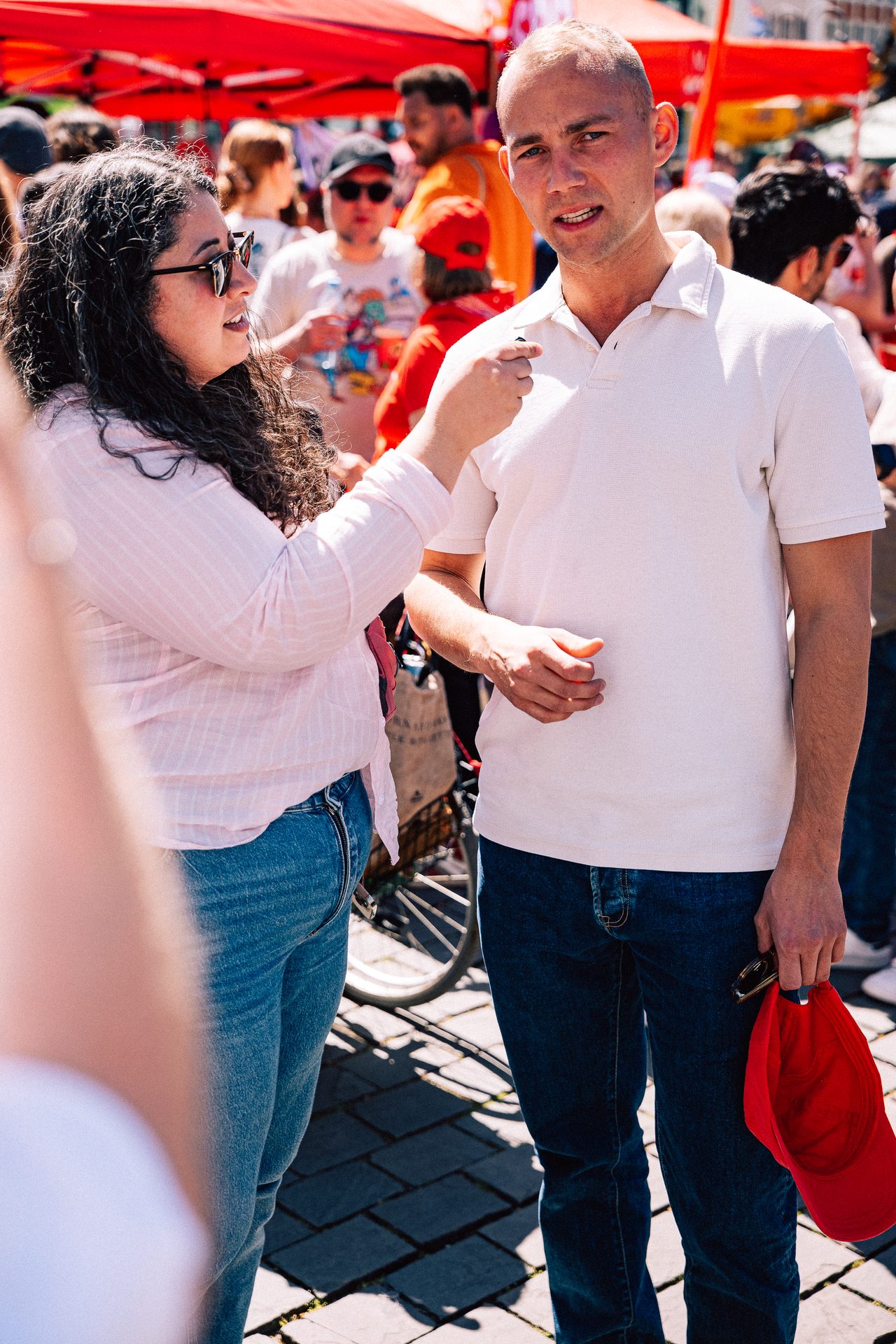 Woman conducting an interview in the middle of a rally